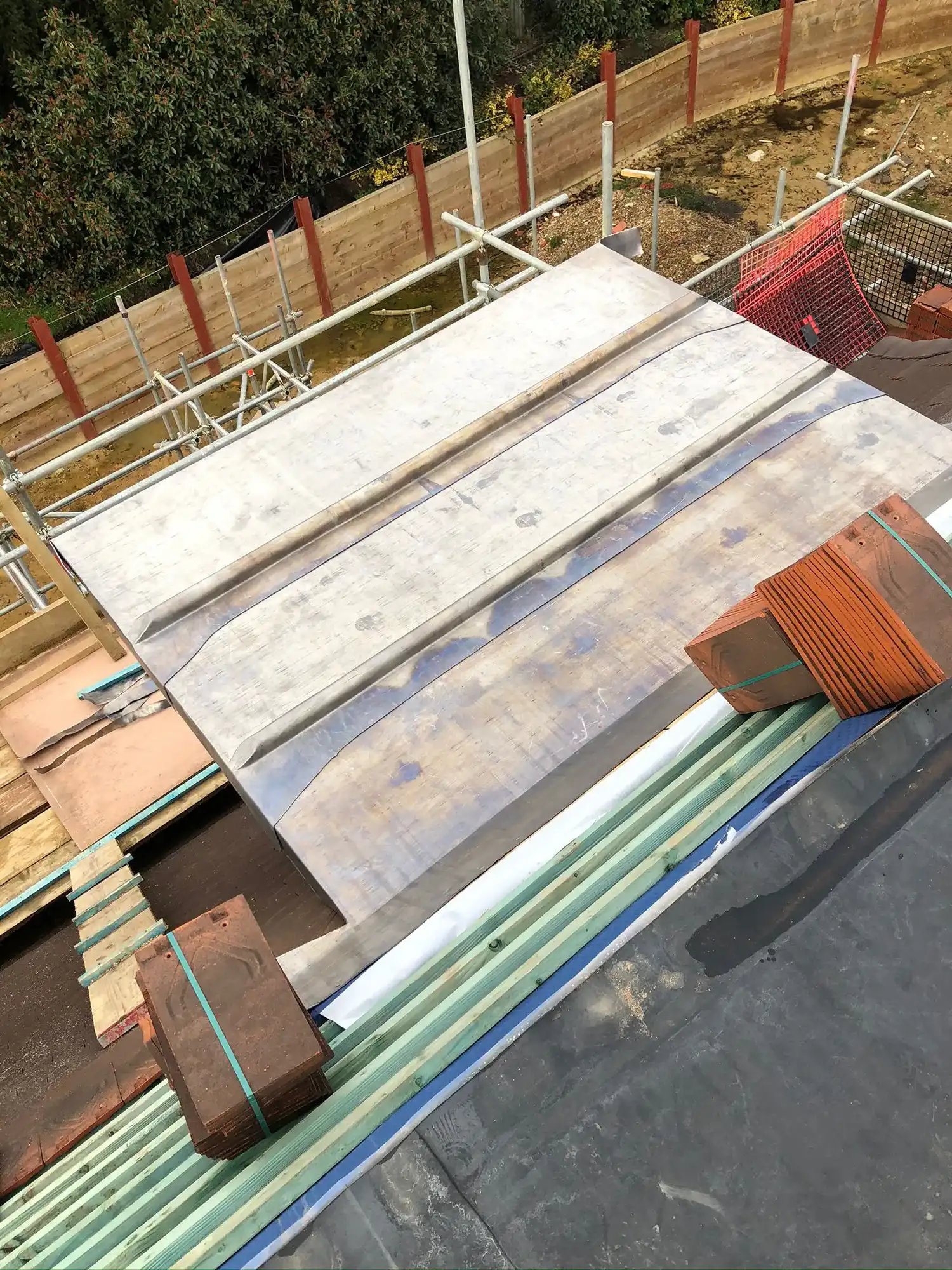 The roof of a building is being constructed.