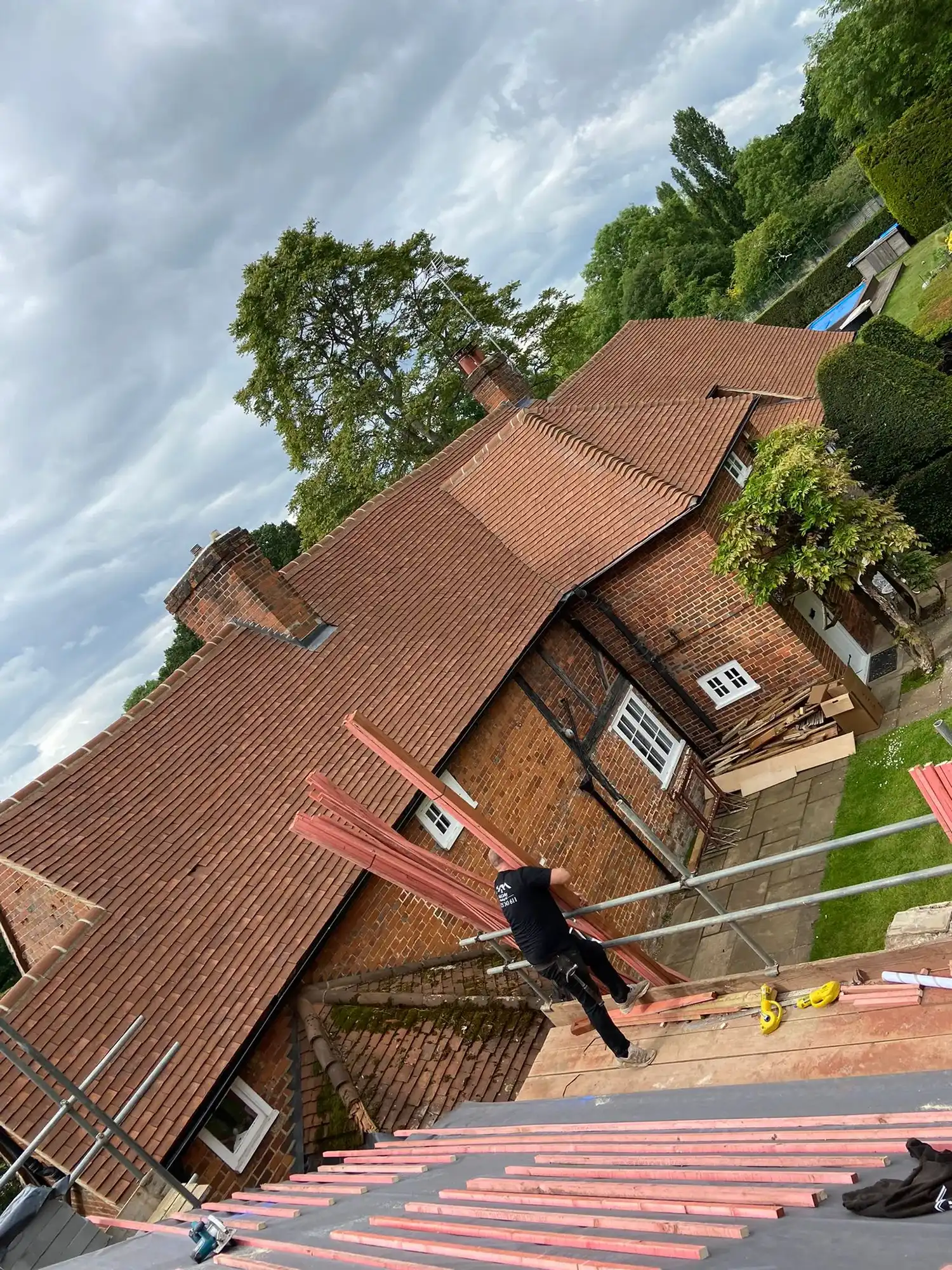 A man riding a skateboard down the side of a ramp.